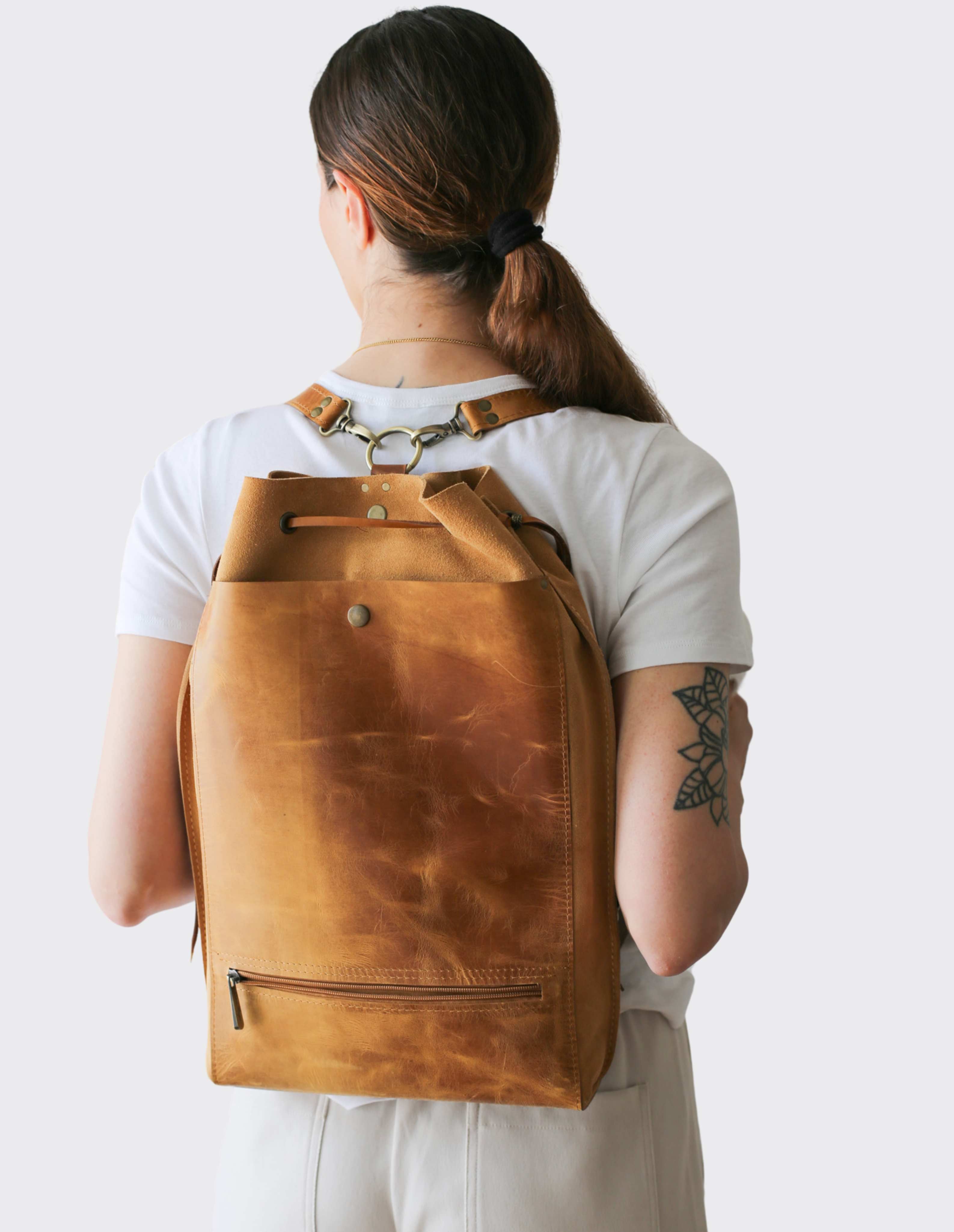 light brown leather backpack purse