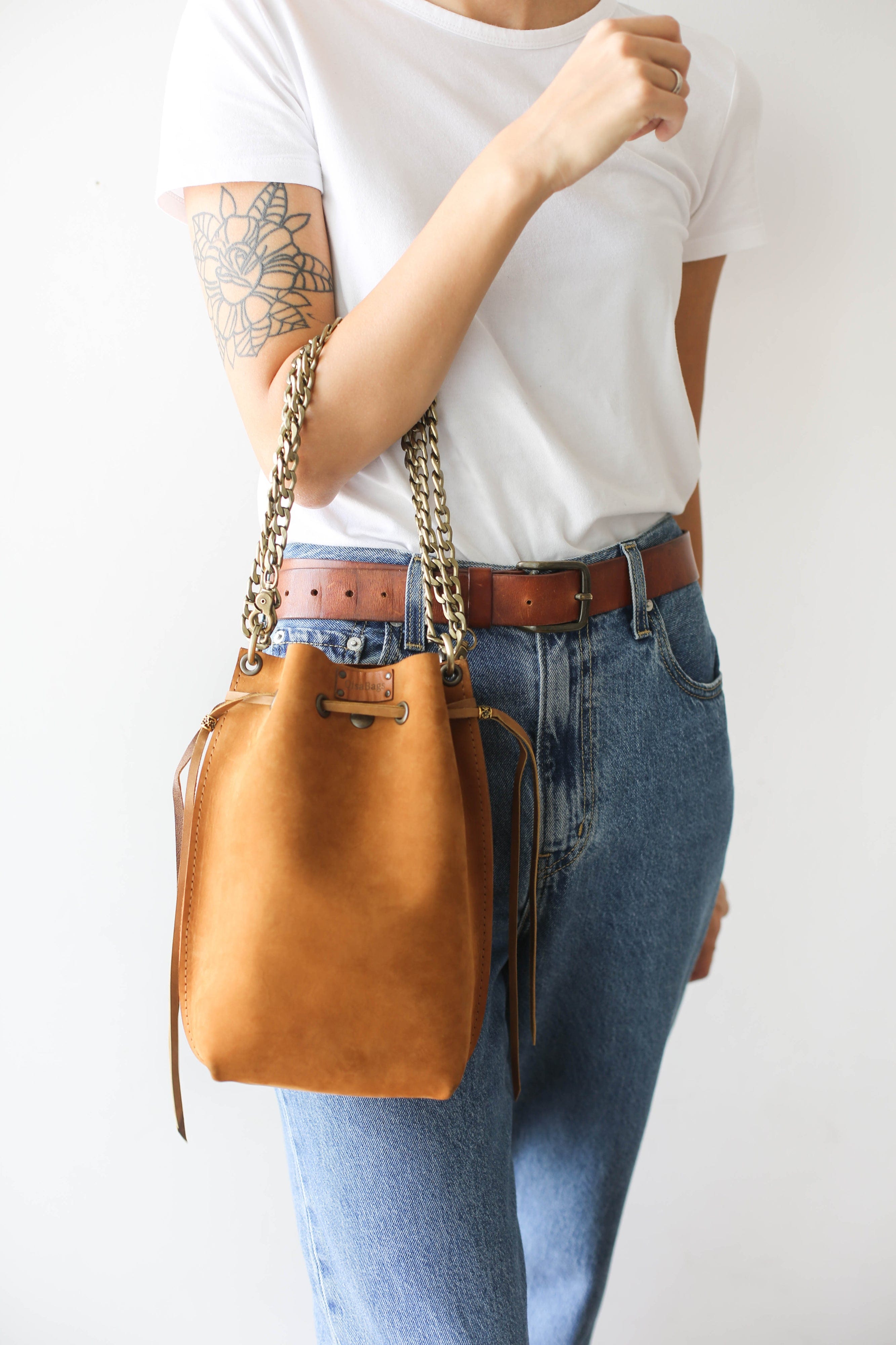 brown leather bucket bag