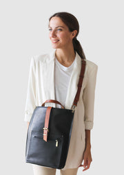 Black crossbody bag with brown straps