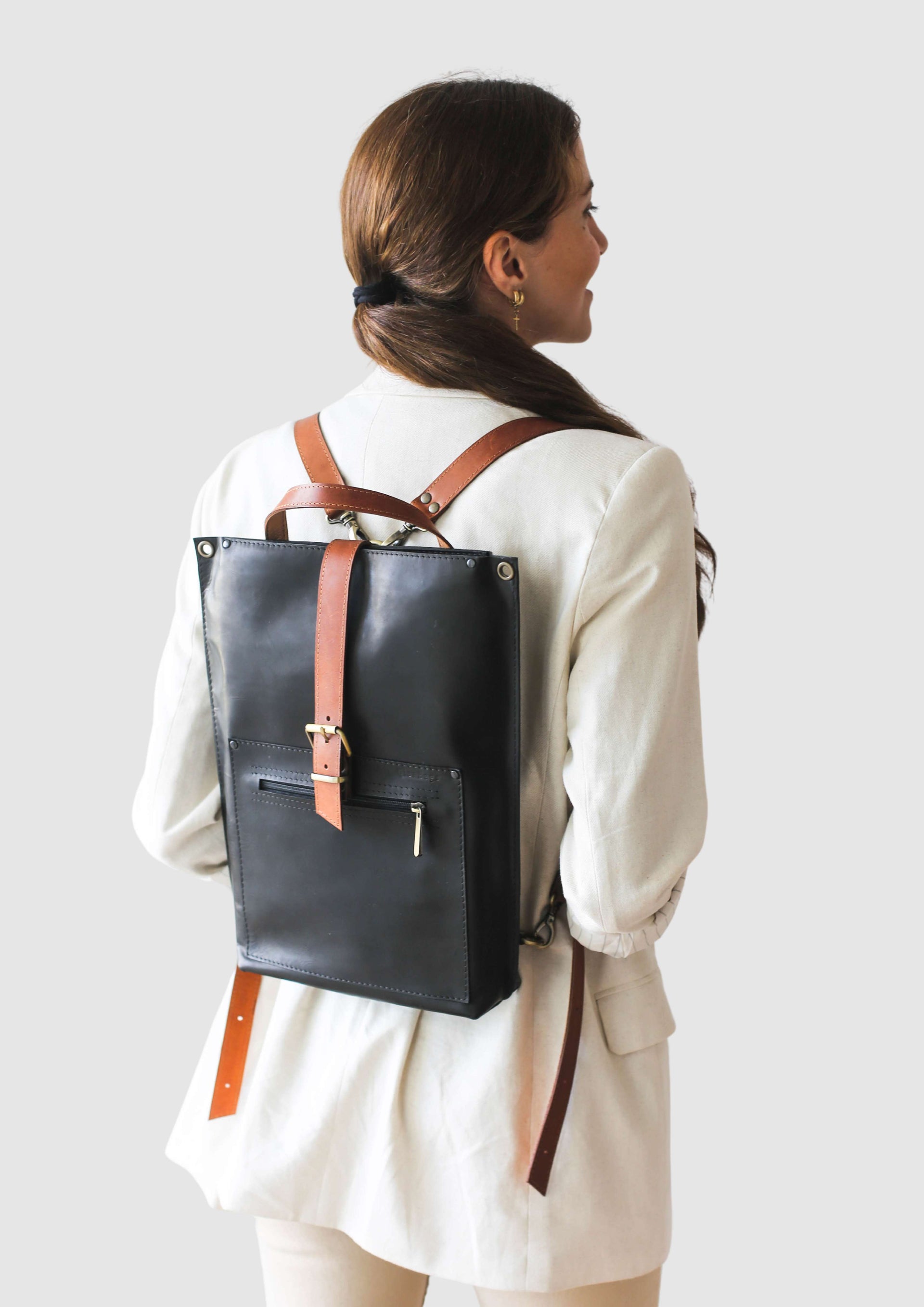 Black leather backpack with zipper