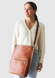 Brown leather cross body backpack