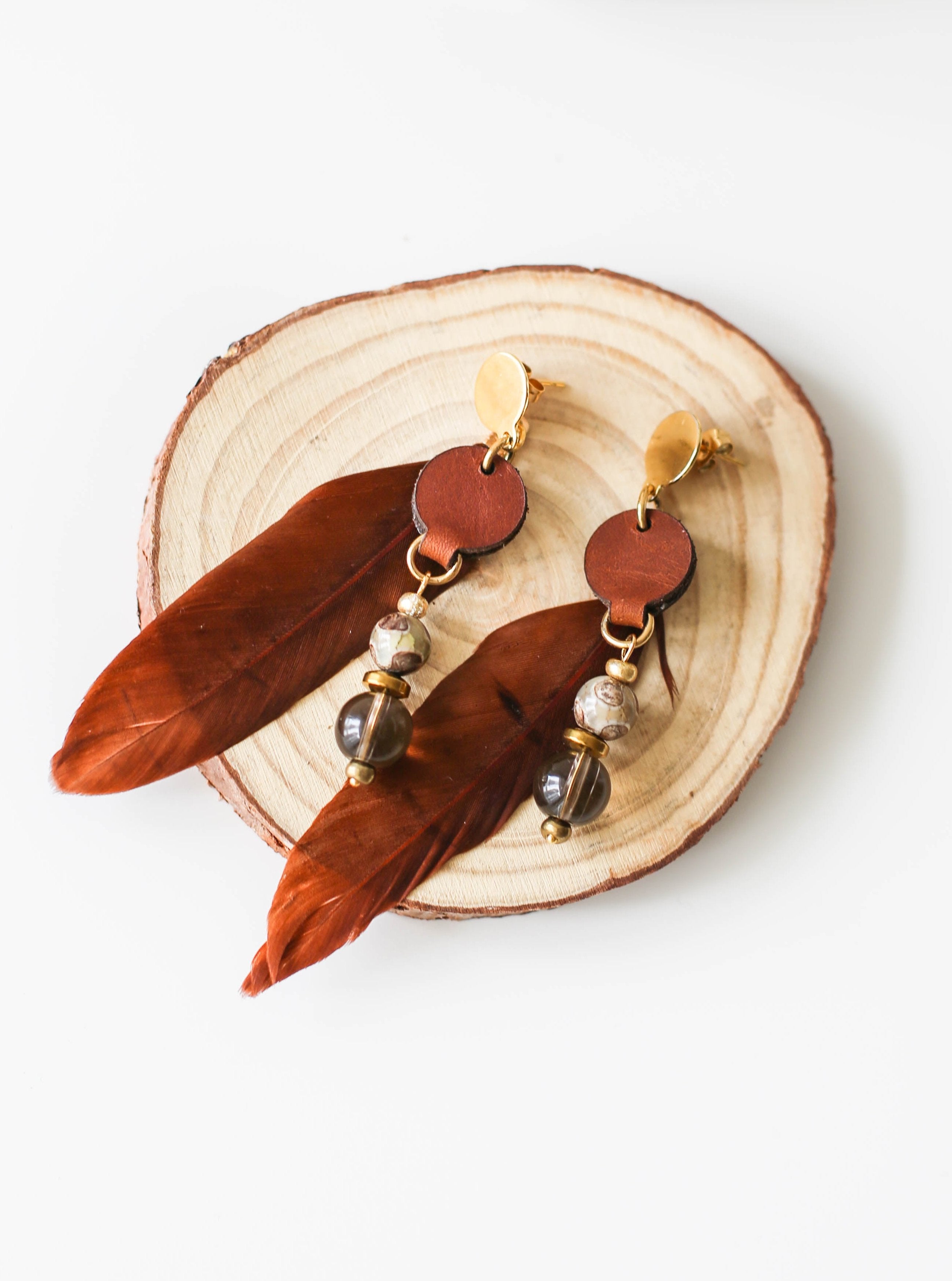 Boho leather earrings with feather