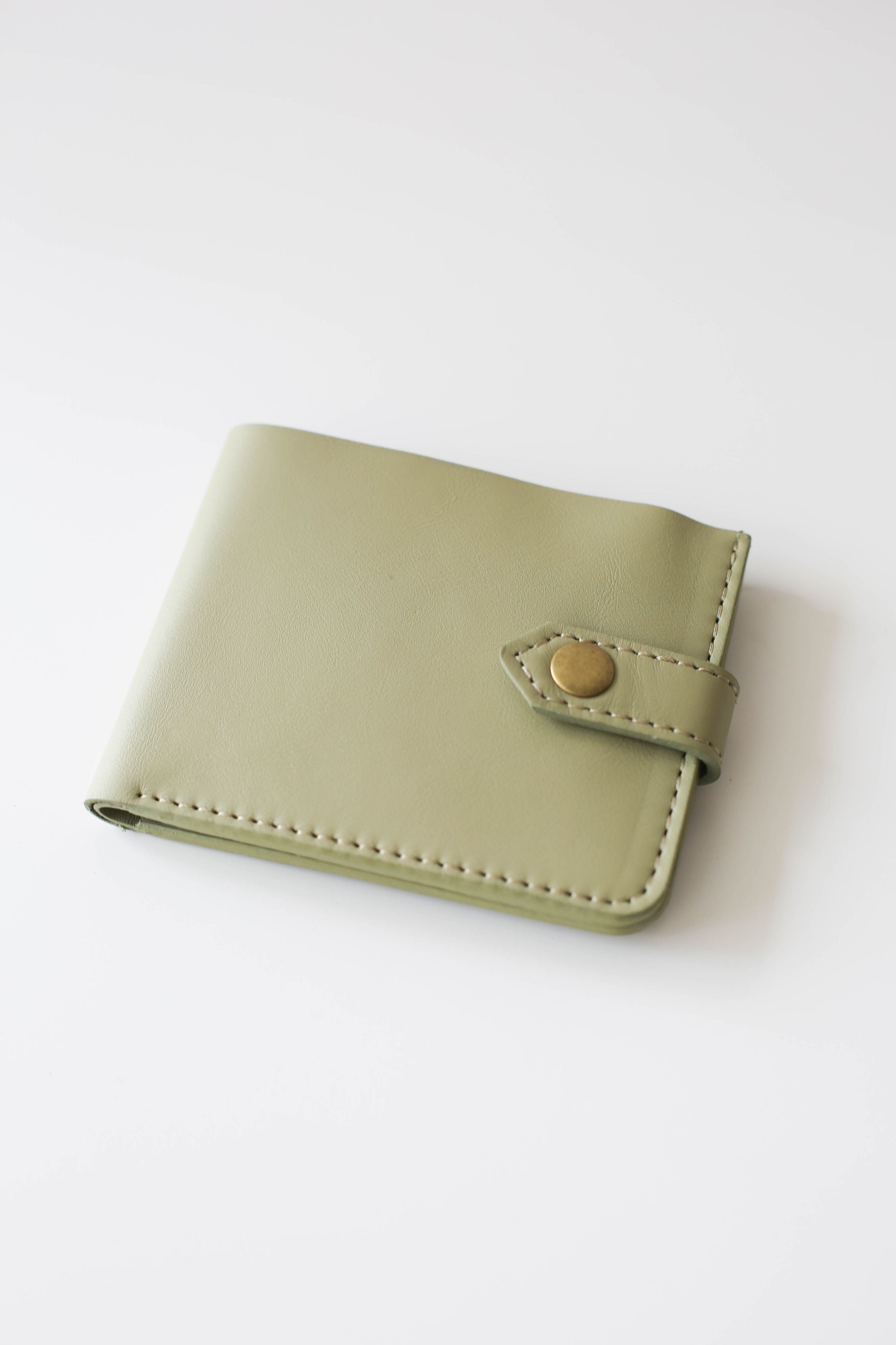 green leather wallet