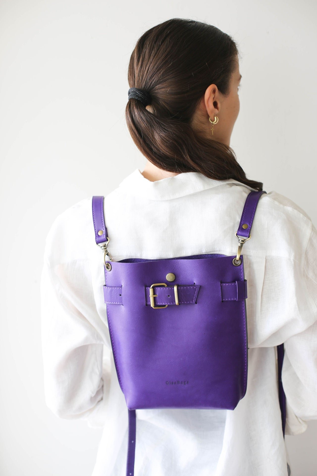 purple leather backpack