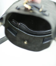 Interior of a black leather handbag