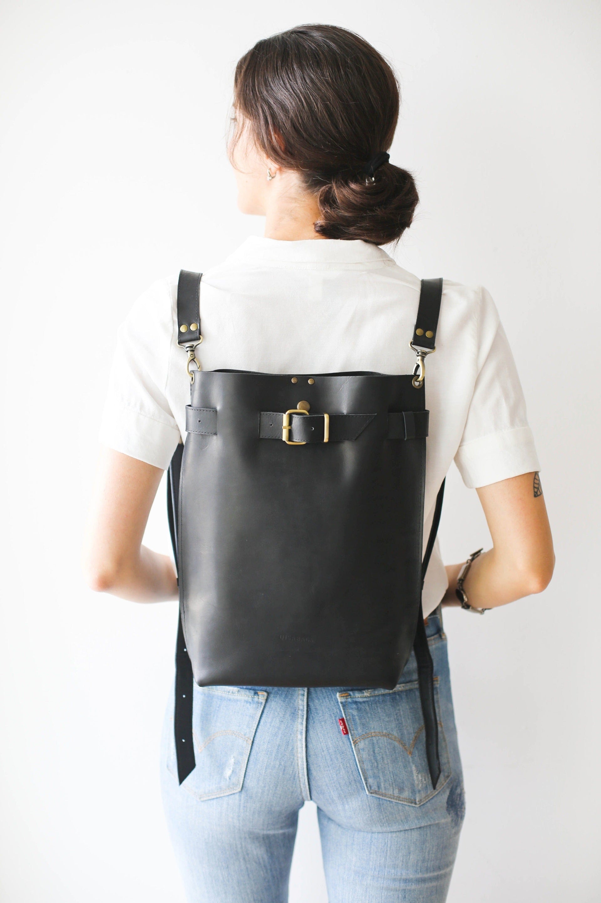 Convertible black leather bag