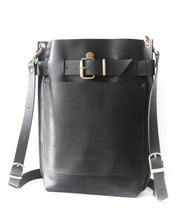 Black leather bag with pockets
