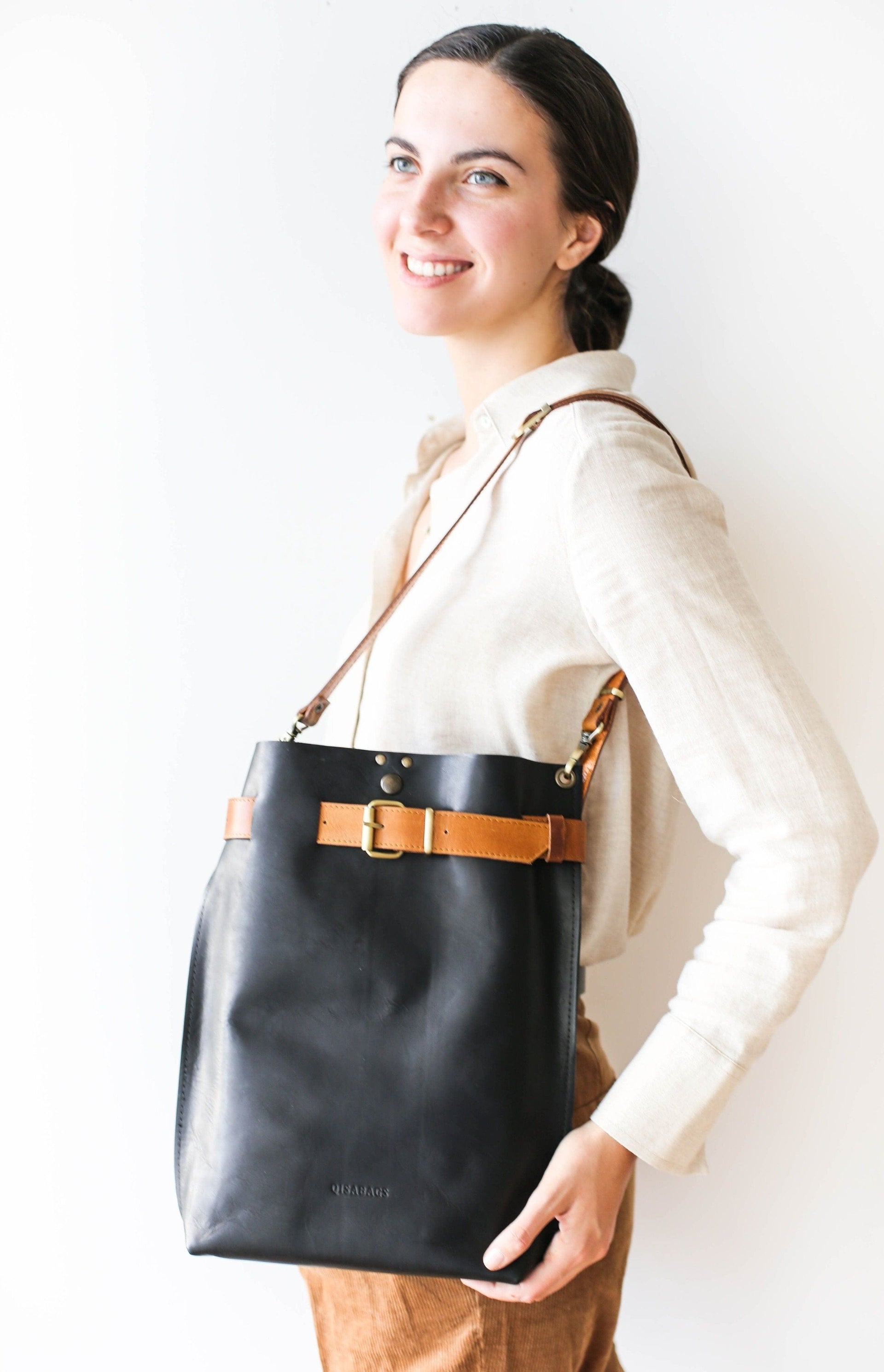 black and brown leather purse