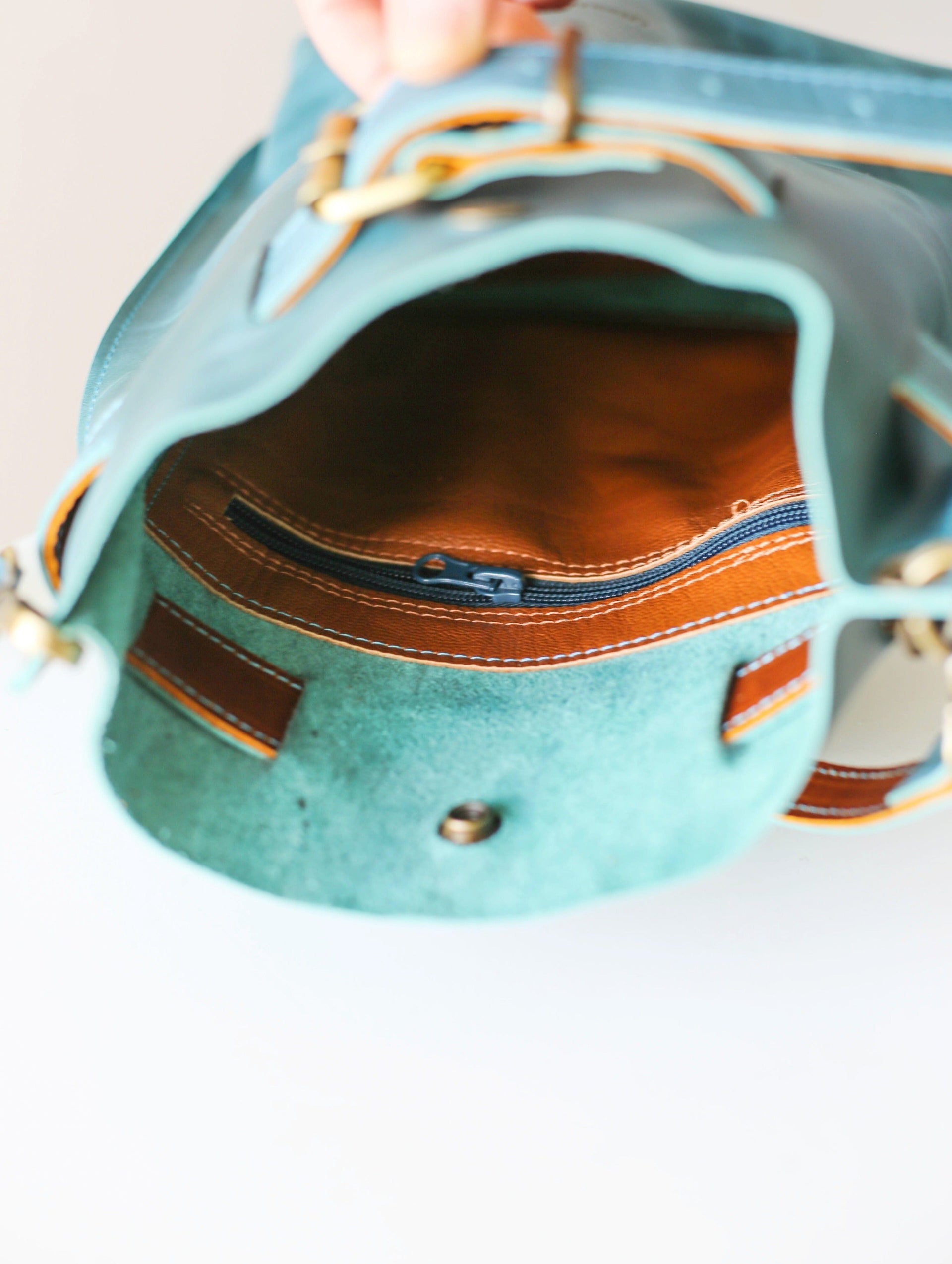interior of a blue leather bag