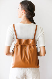 tan leather backpack