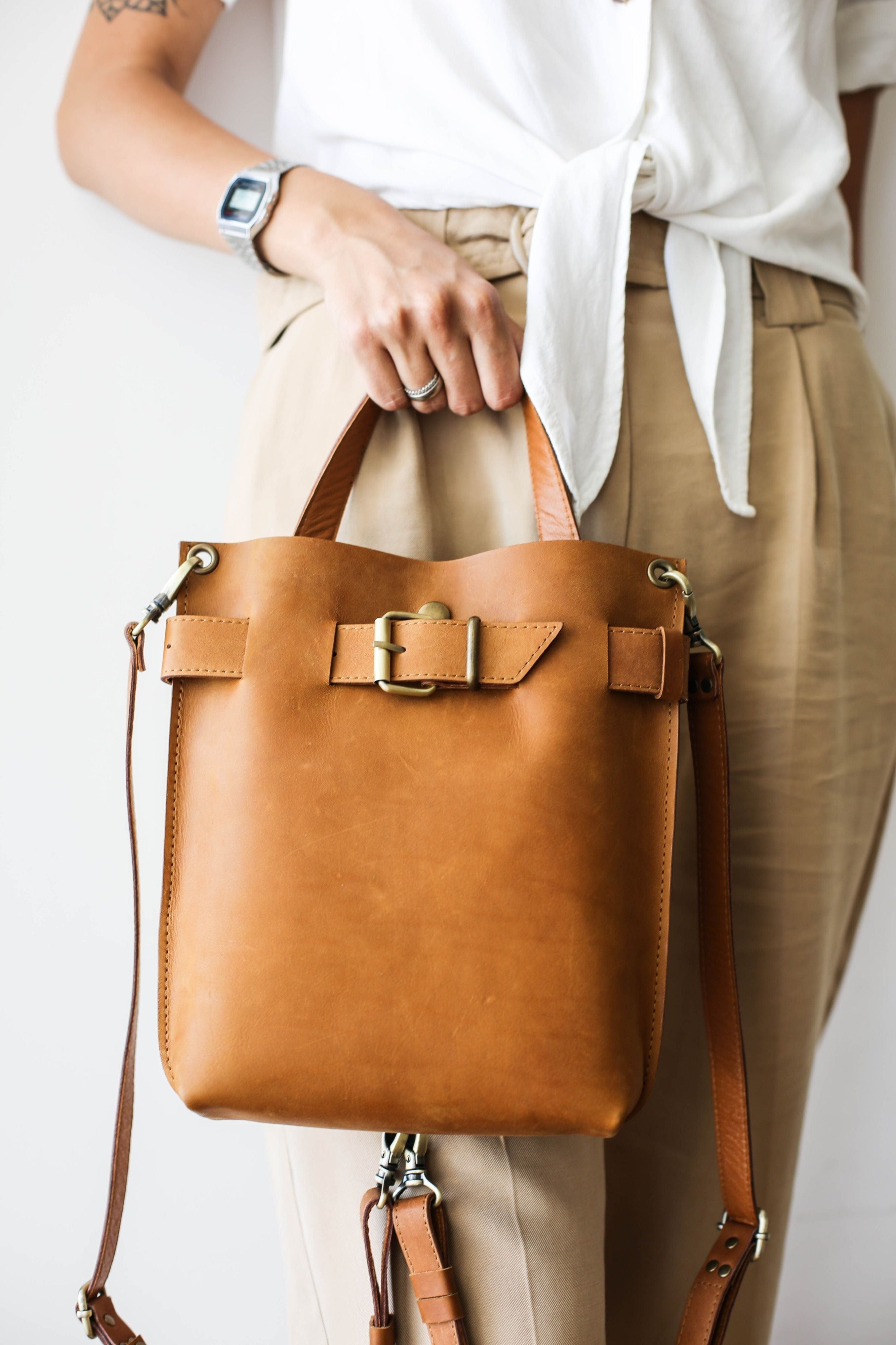 small brown leather backpack