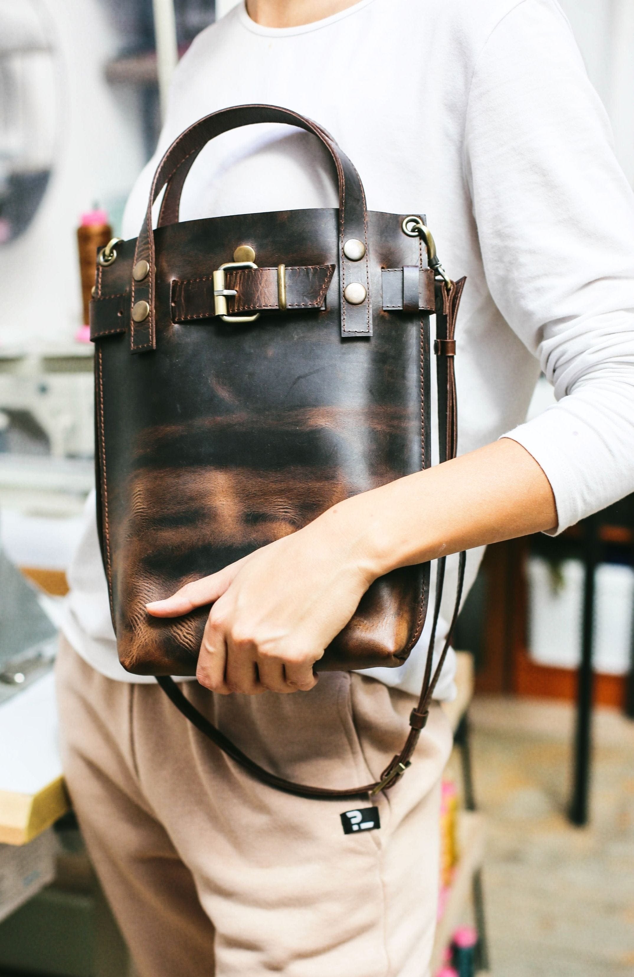 dark brown leather shoulder bag