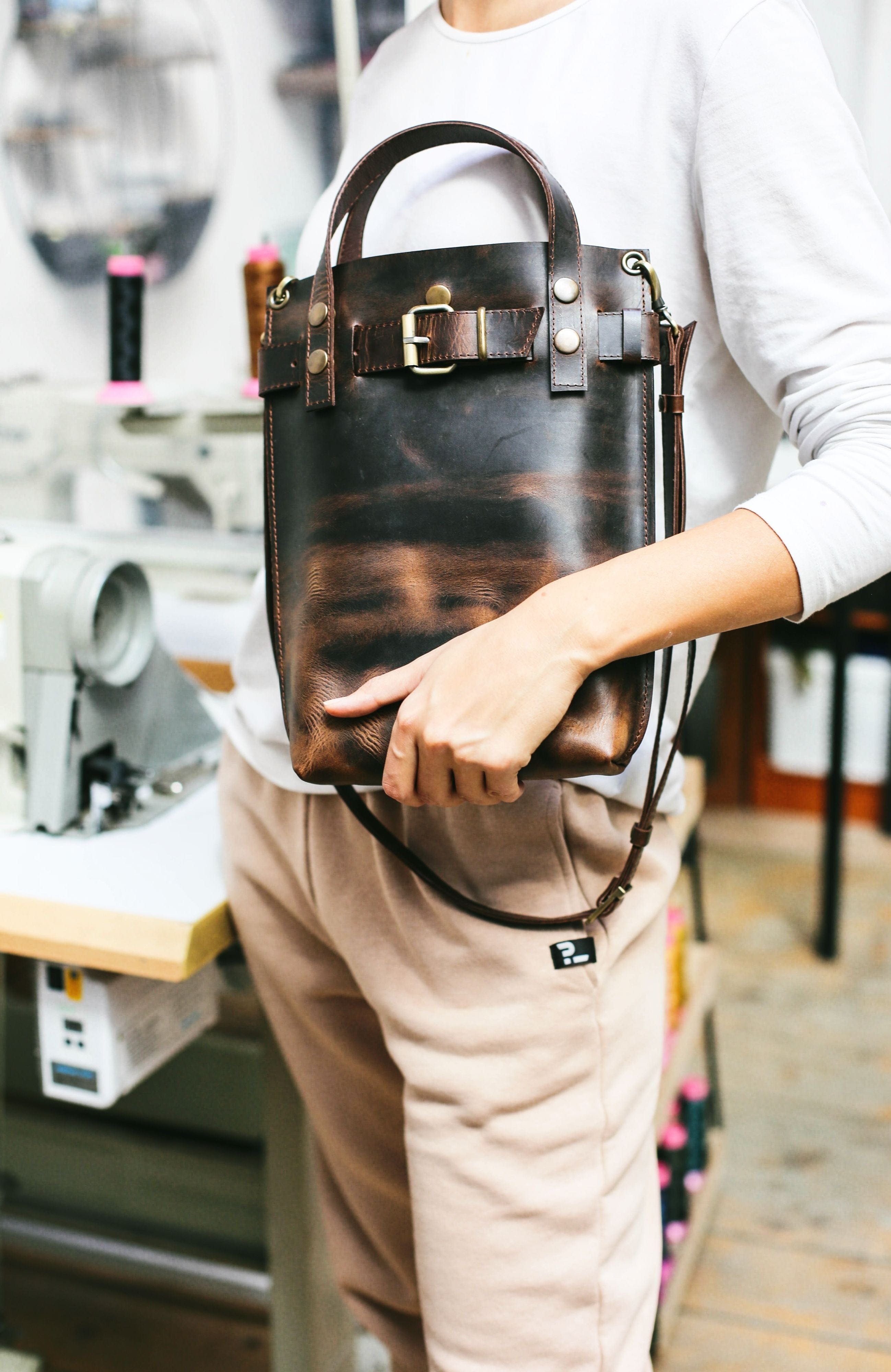 dark brown leather shoulder bag