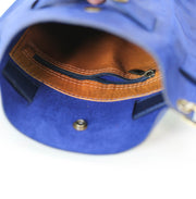 Interior of a blue leather bag
