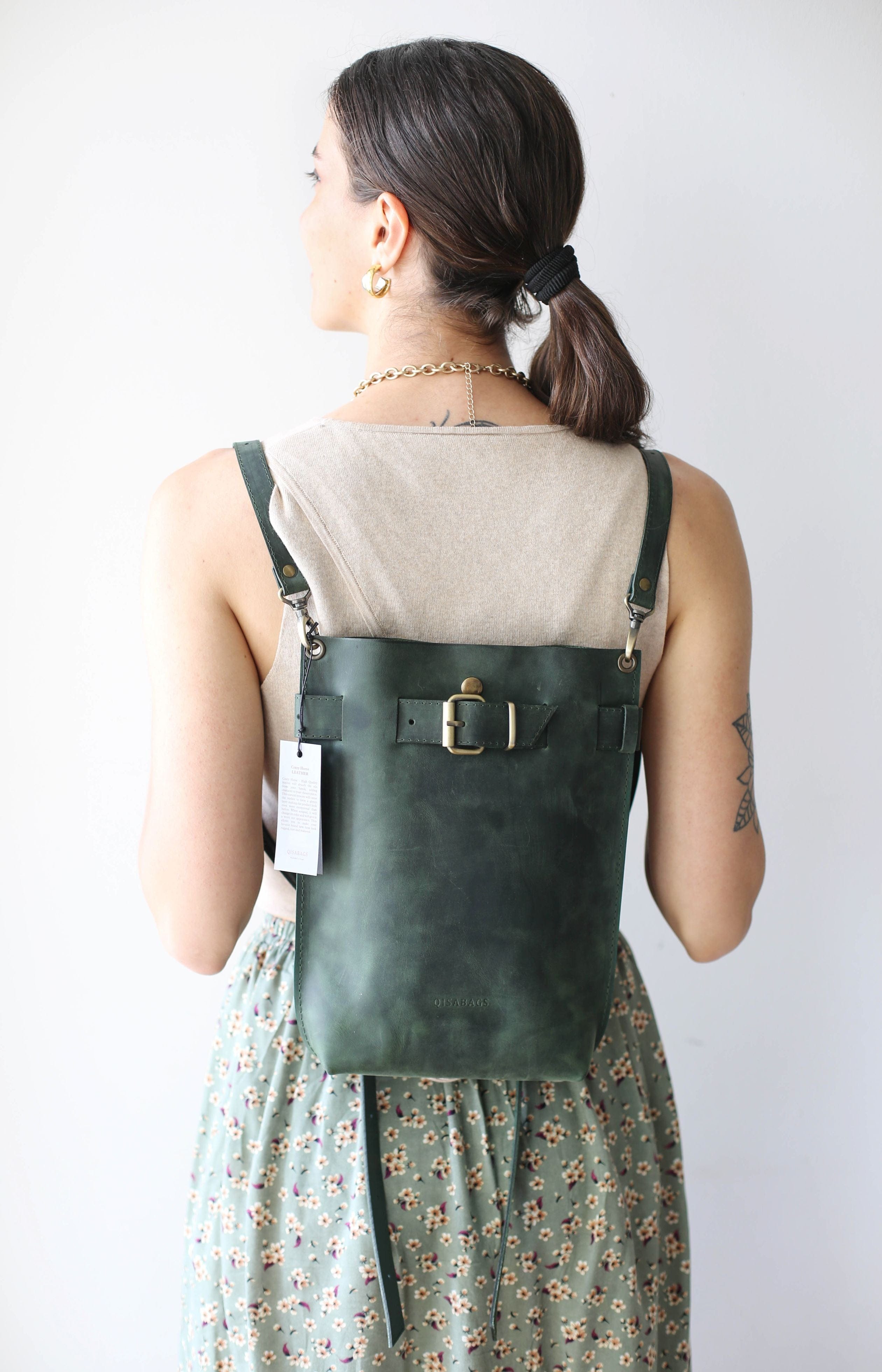 green leather backpack