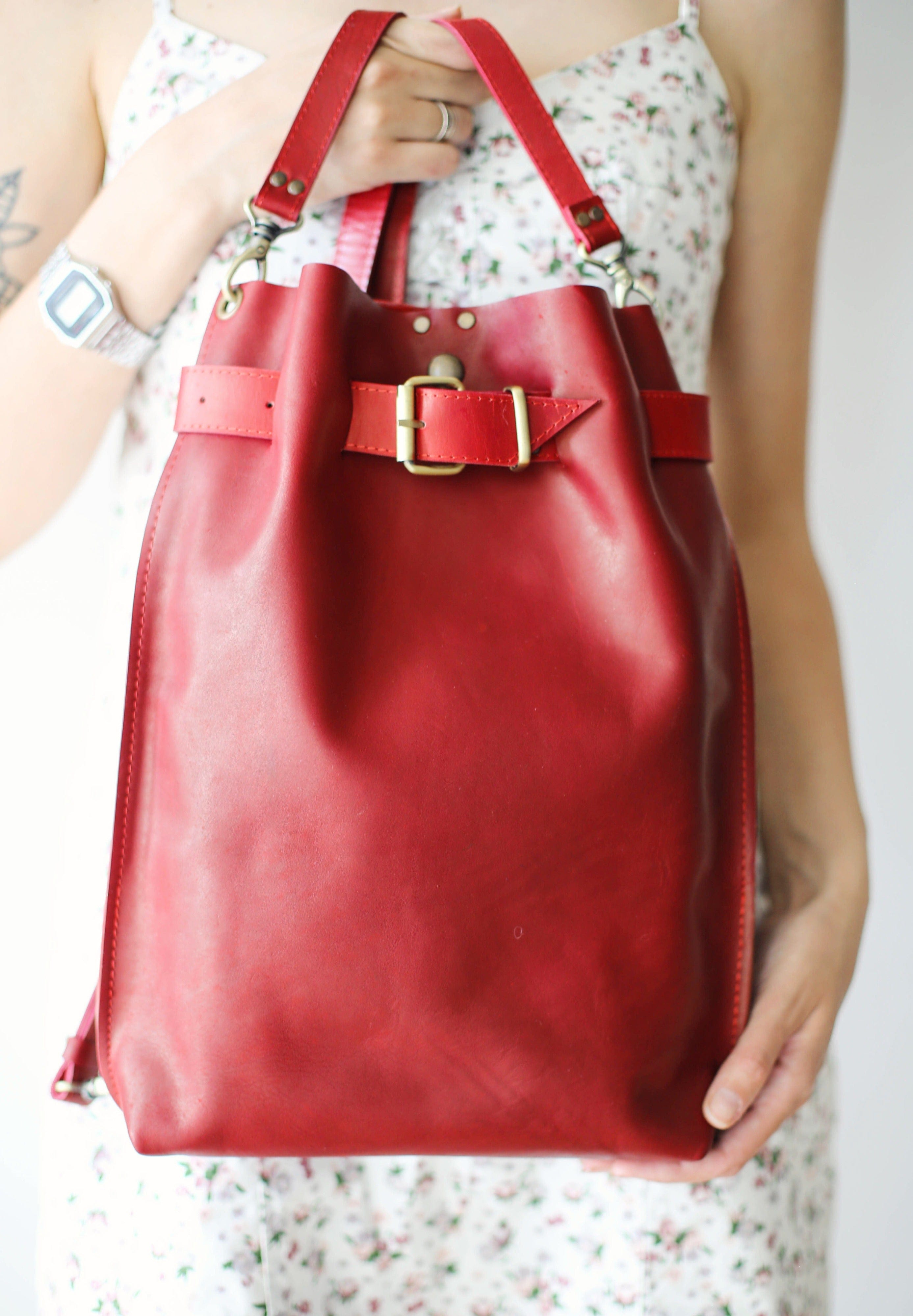 red leather backpack purse