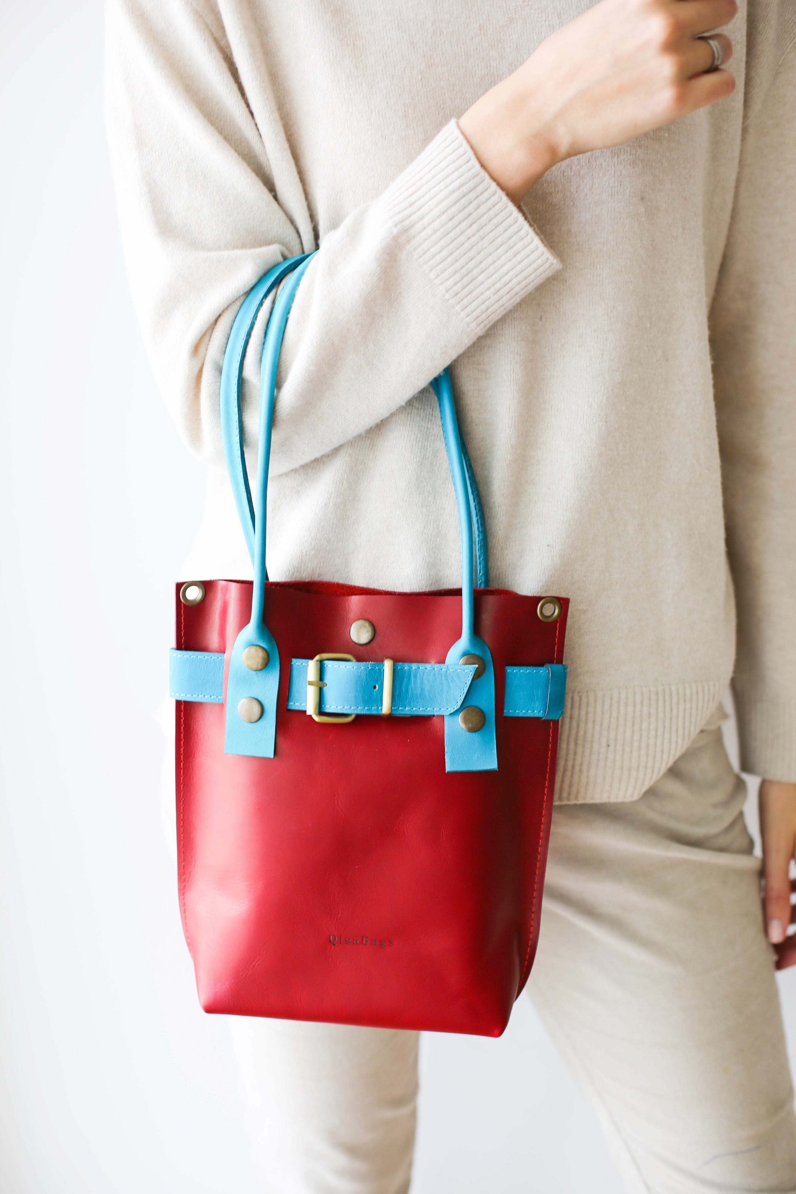 Red and blue handbag on sale