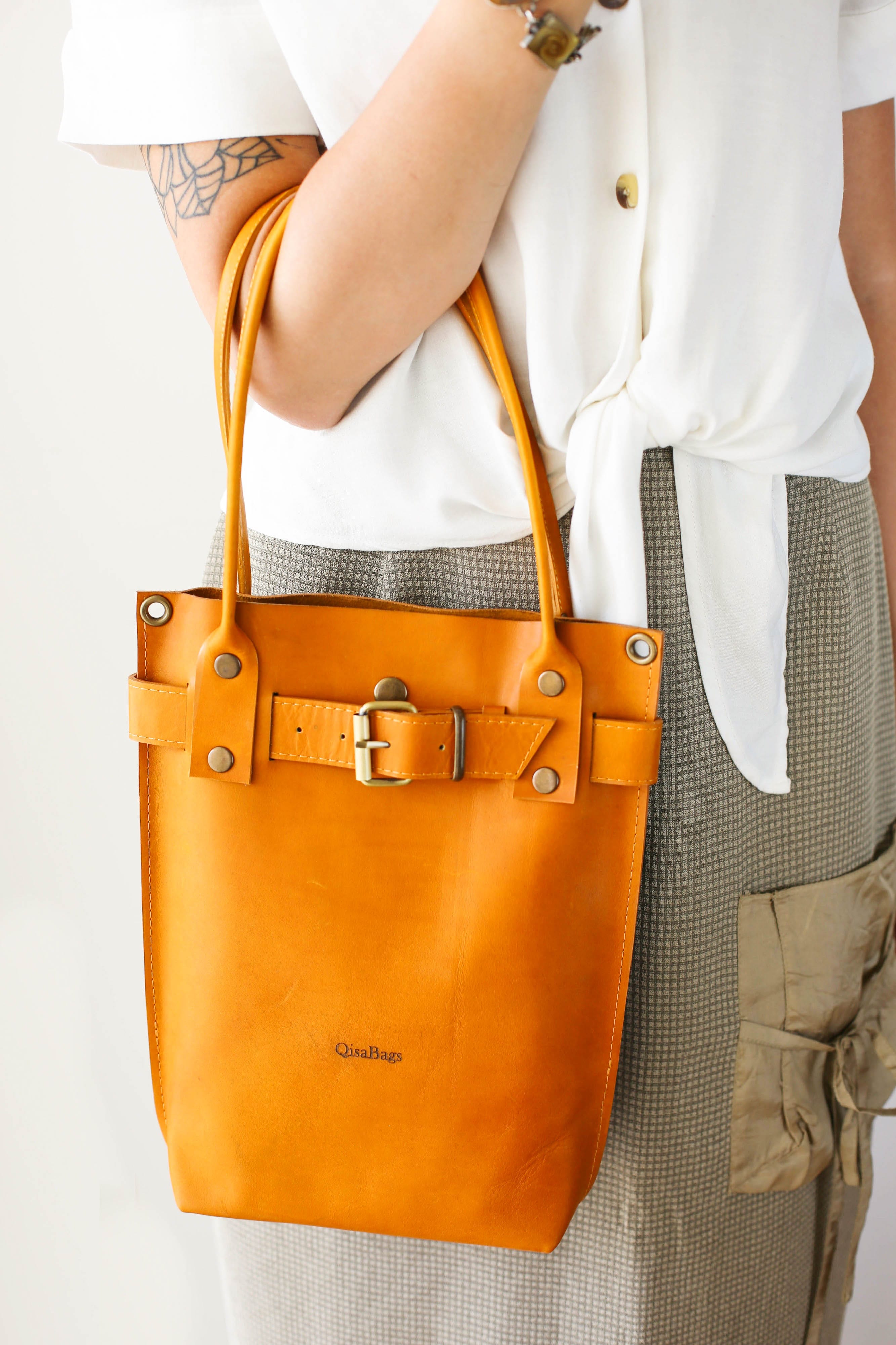 yellow designer bag